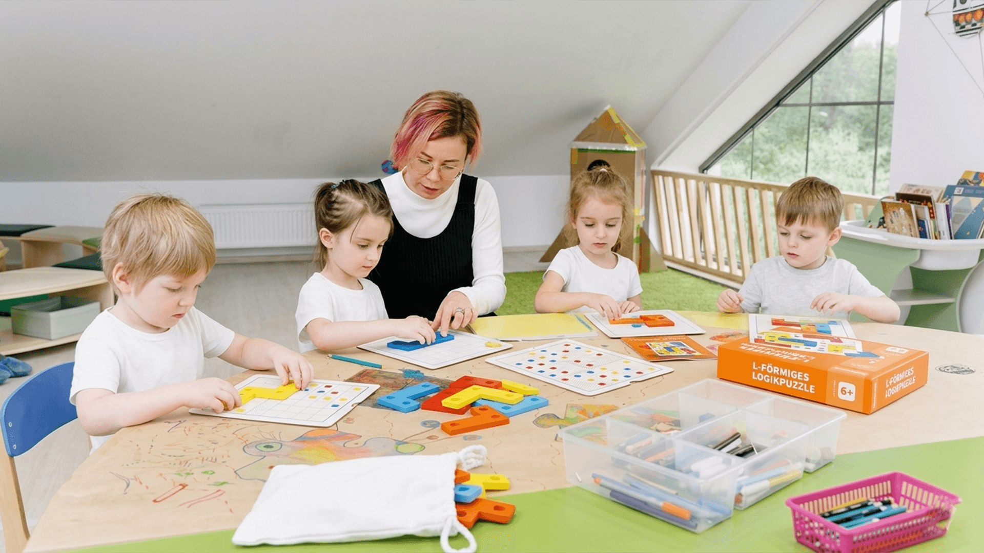 Teacher helping child